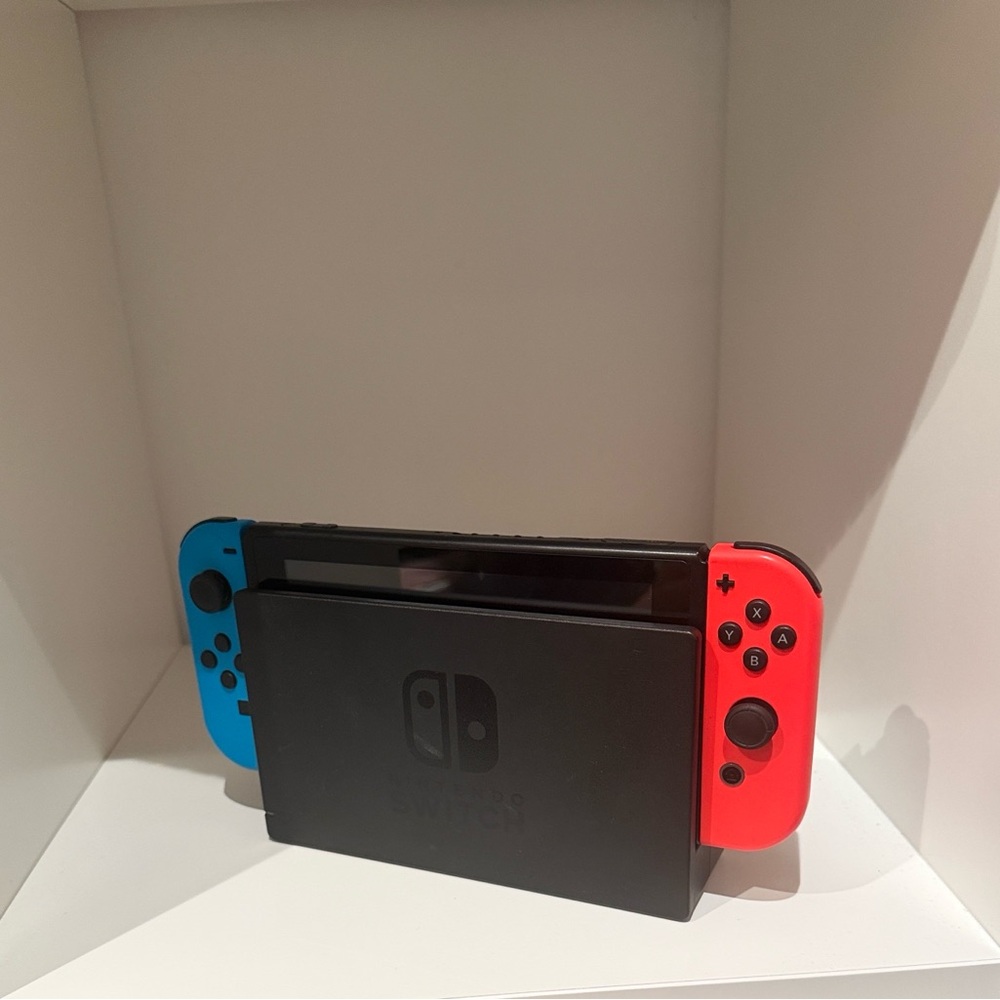 Nintendo Switch Console with Vibrant Blue and Red Controllers